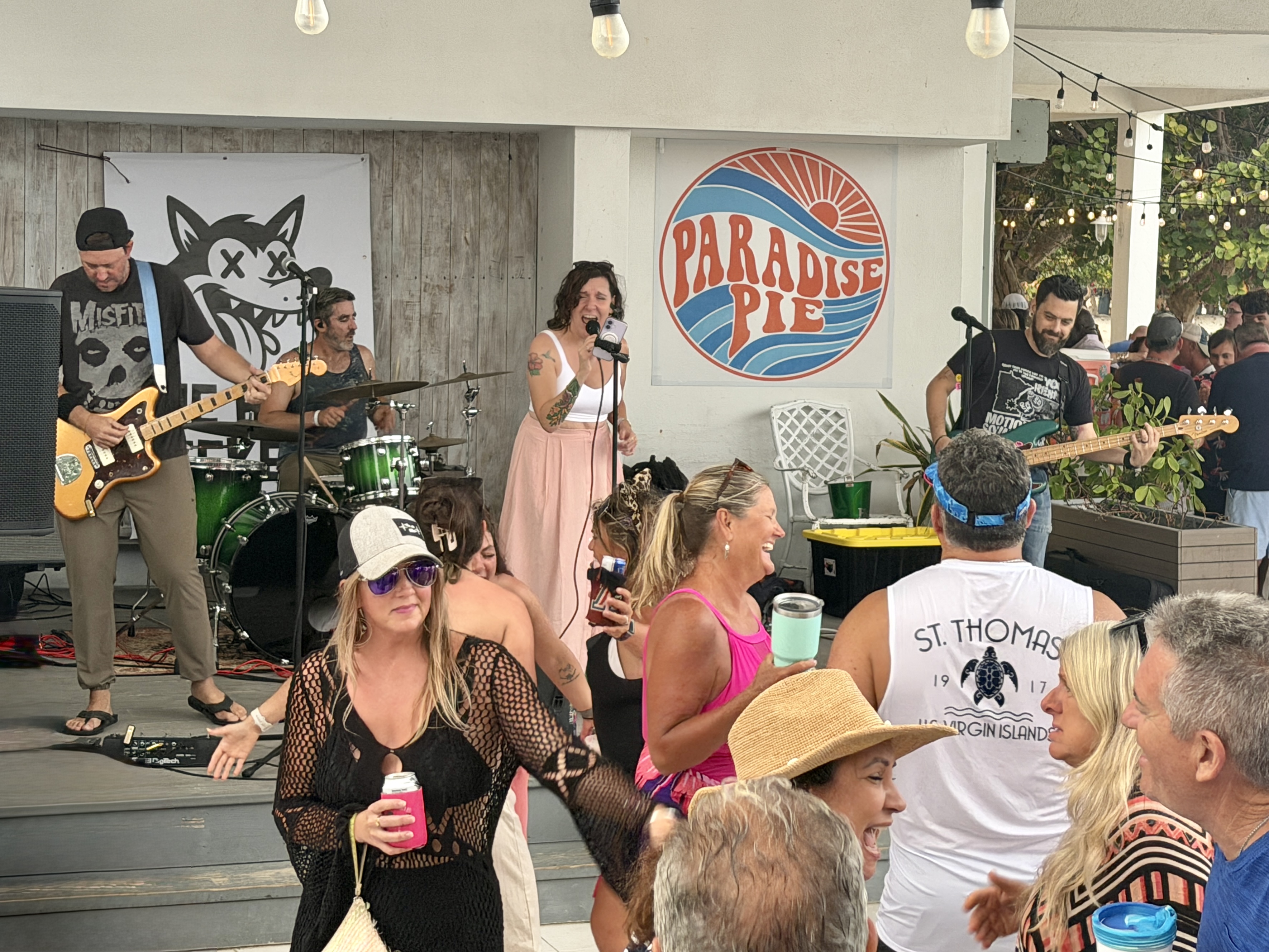Crowd having a blast dancing to The Heat Seekers at Sapphire Beach Bar St Thomas USVI