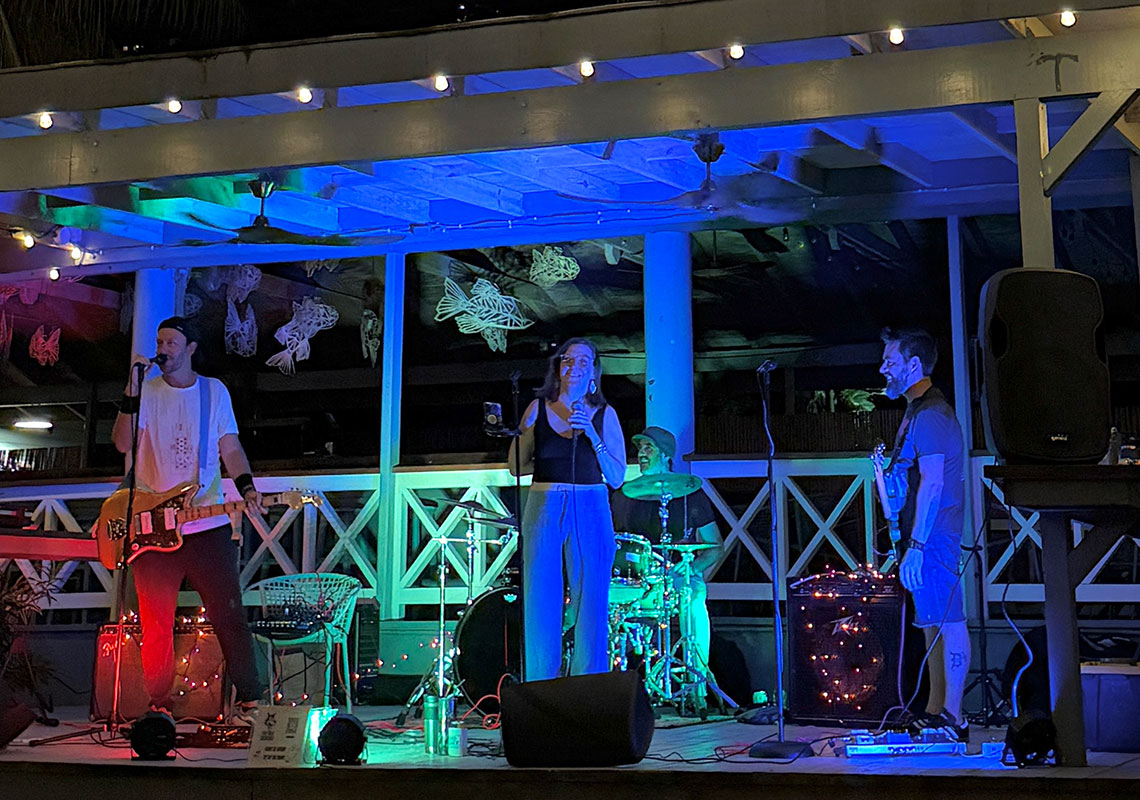The Heat Seekers full band on stage with colorful lighting at Hull Bay Hideaway live music St Thomas