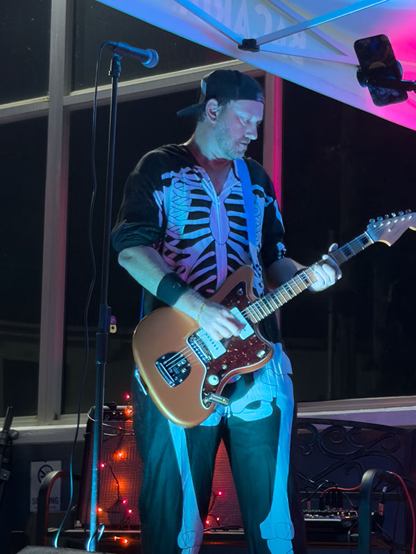 Heat Seekers guitarist Steve playing Fender Jazzmaster on stage in St Thomas